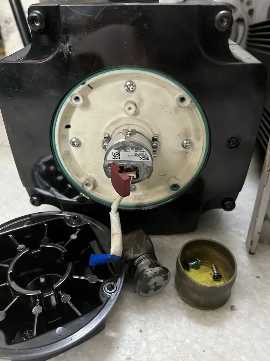 Servo motor repair in India: winding and bearing check on an opened motor