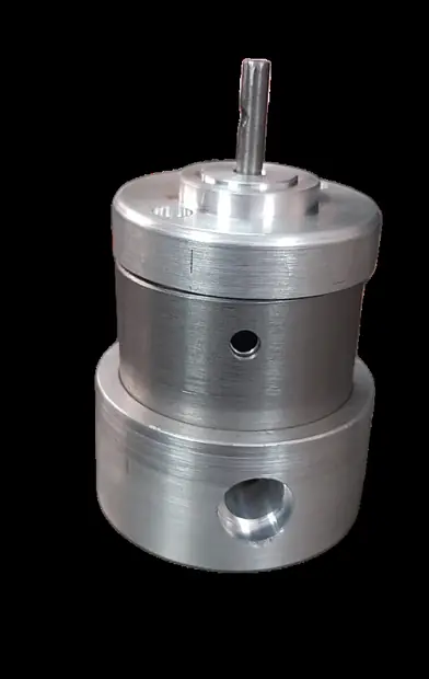 Machined motor housing and end shield with output shaft