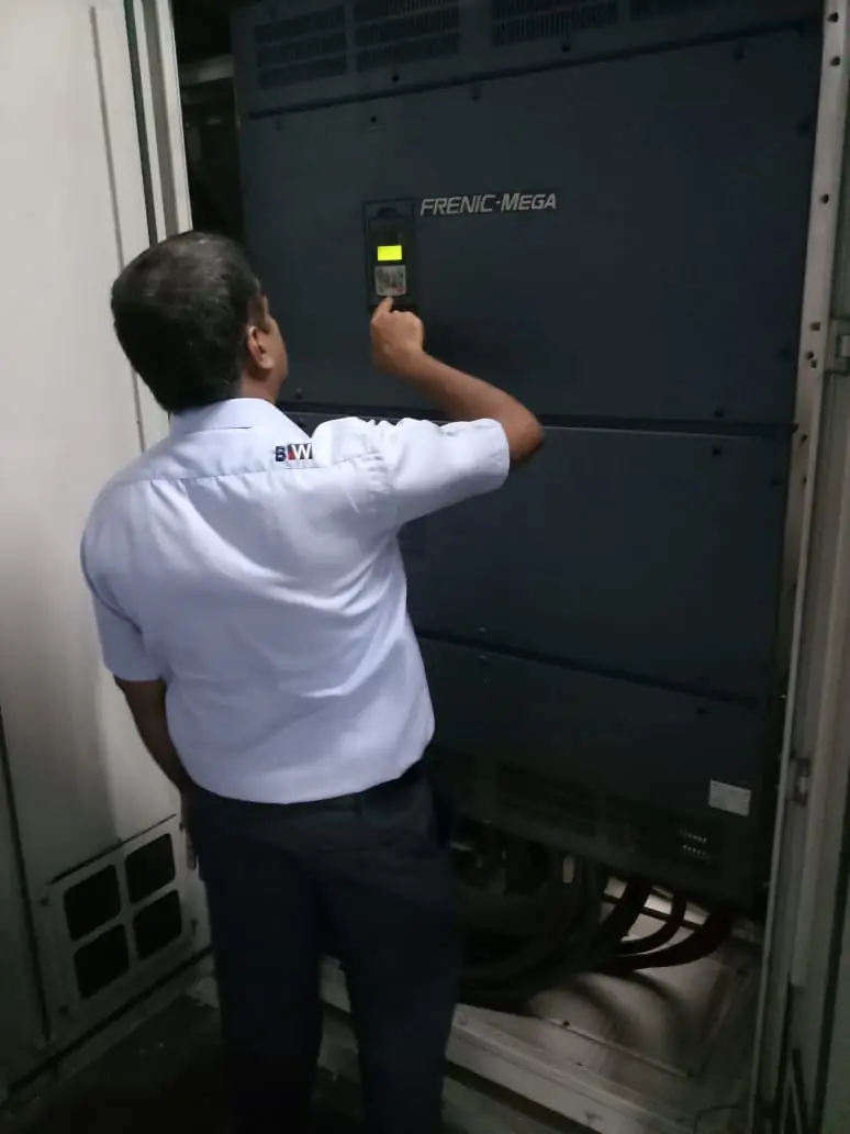 Star Automations engineer working on a large VFD on site