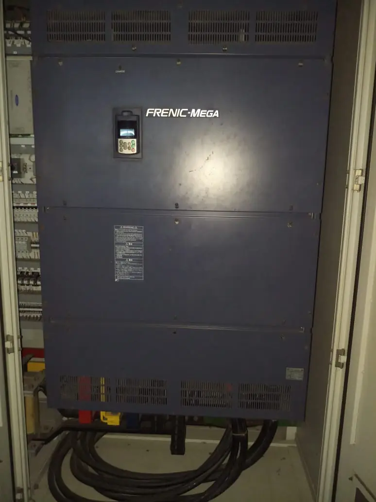 Large VFD in its panel during on-site maintenance